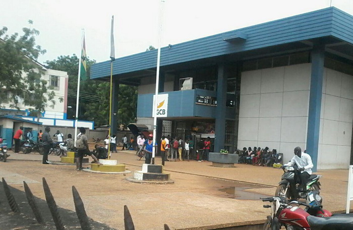 Some of the youth gathered in front of the GCB Bank at Bolgatanga